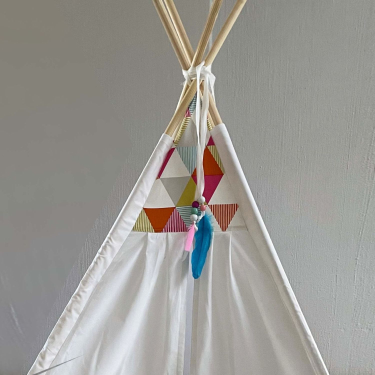 White teepee with colourful triangles details