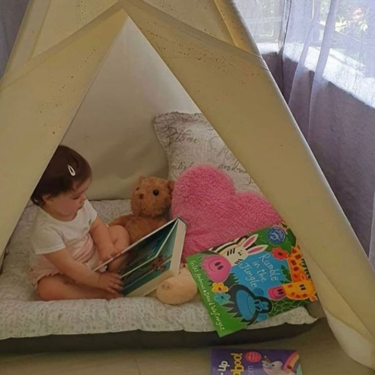 Use a teepee as a reading nook.