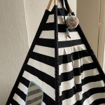 Black and white striped teepees with pom pom